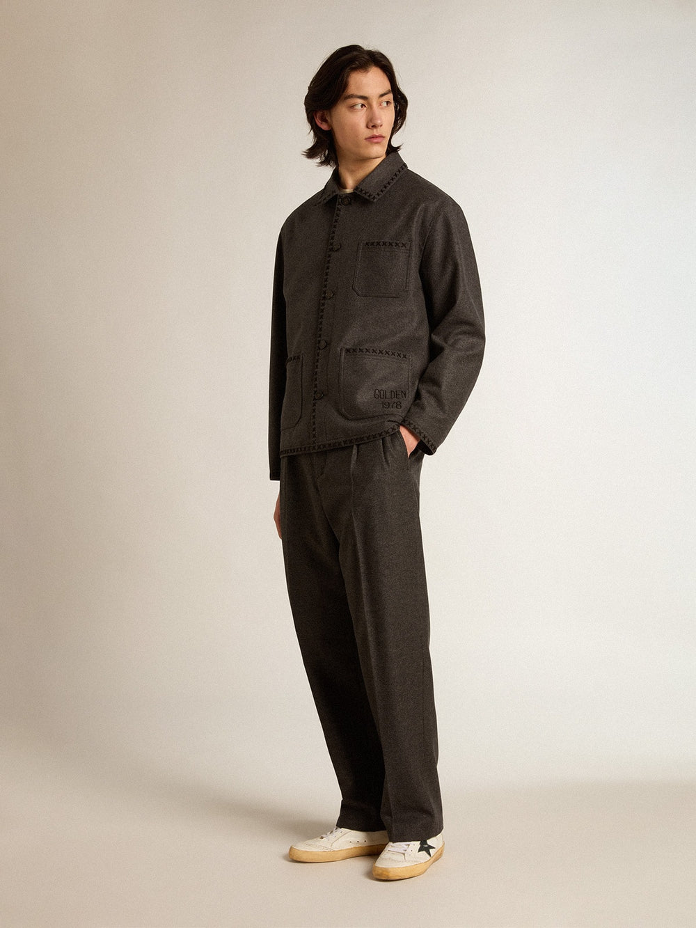 Gray melange woolen jacket with button fastening