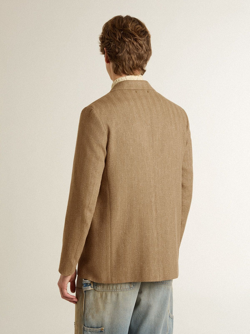 Men's single-breasted blazer in a sand-colored chevron linen blend.