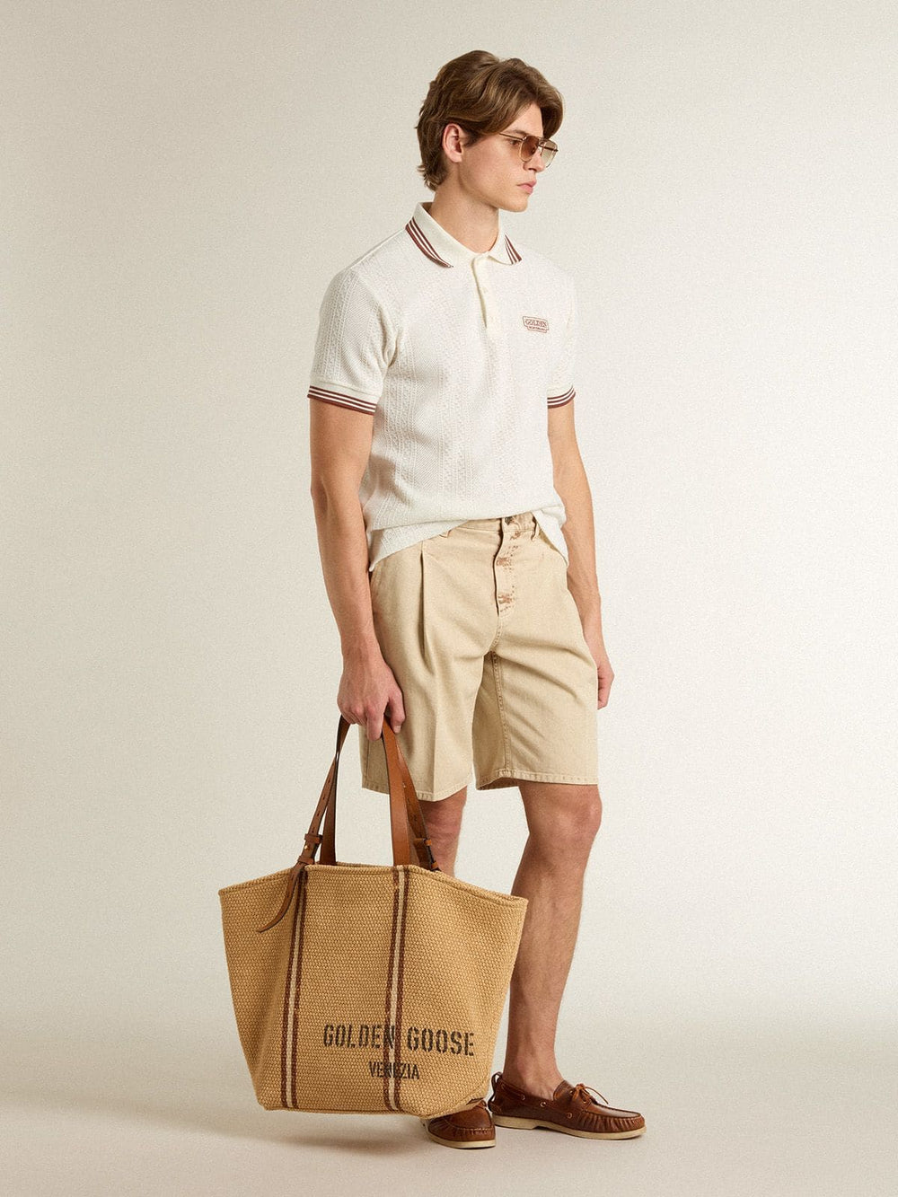 Men's polo shirt in white perforated knit with burgundy striped details