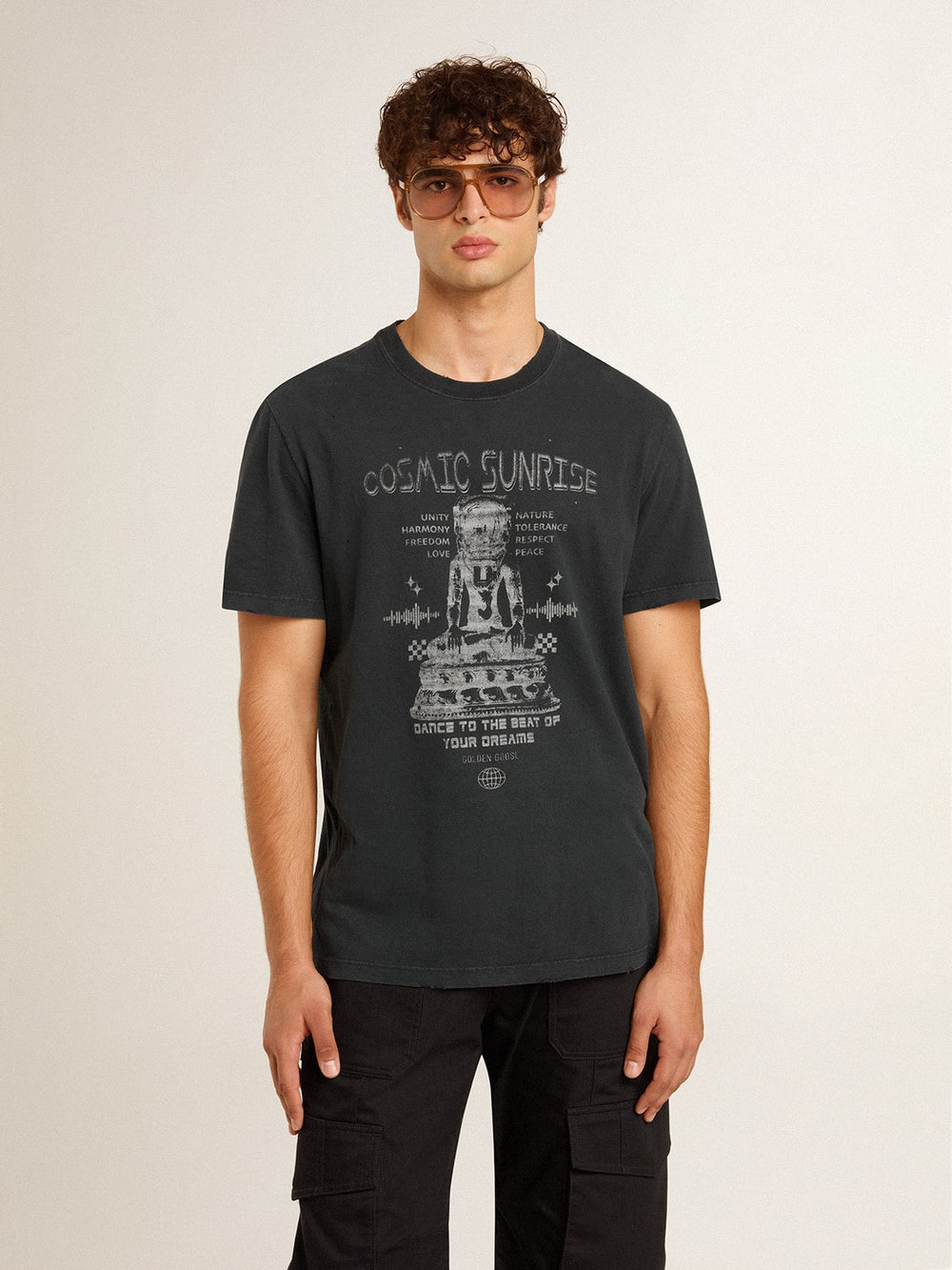 Men’s worn-black cotton T-shirt with print on the front