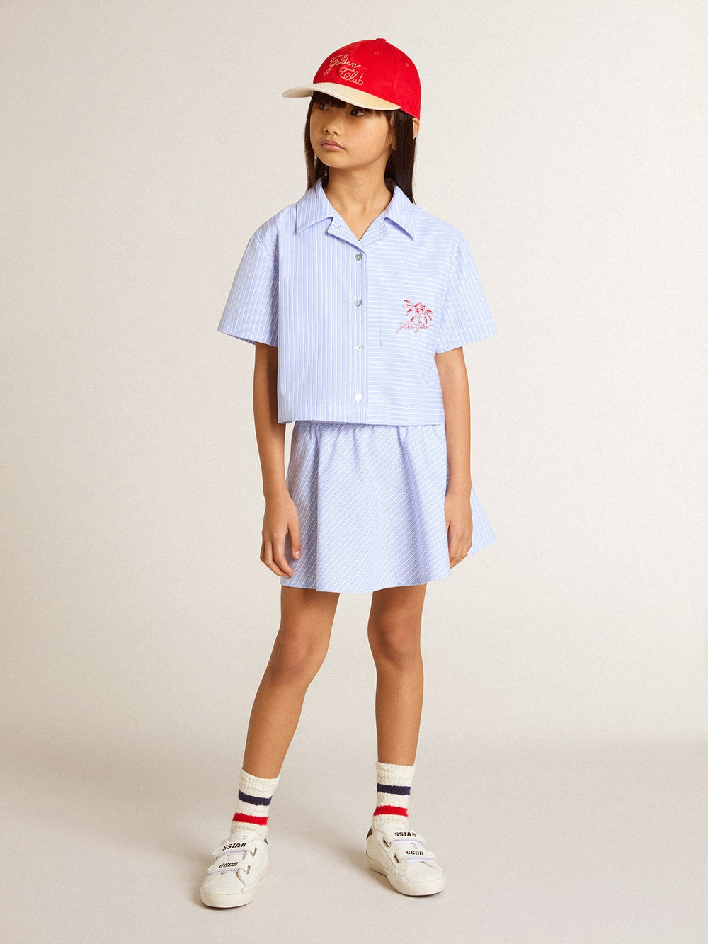 Girls' cropped shirt in striped light blue cotton