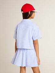 Girls' cropped shirt in striped light blue cotton