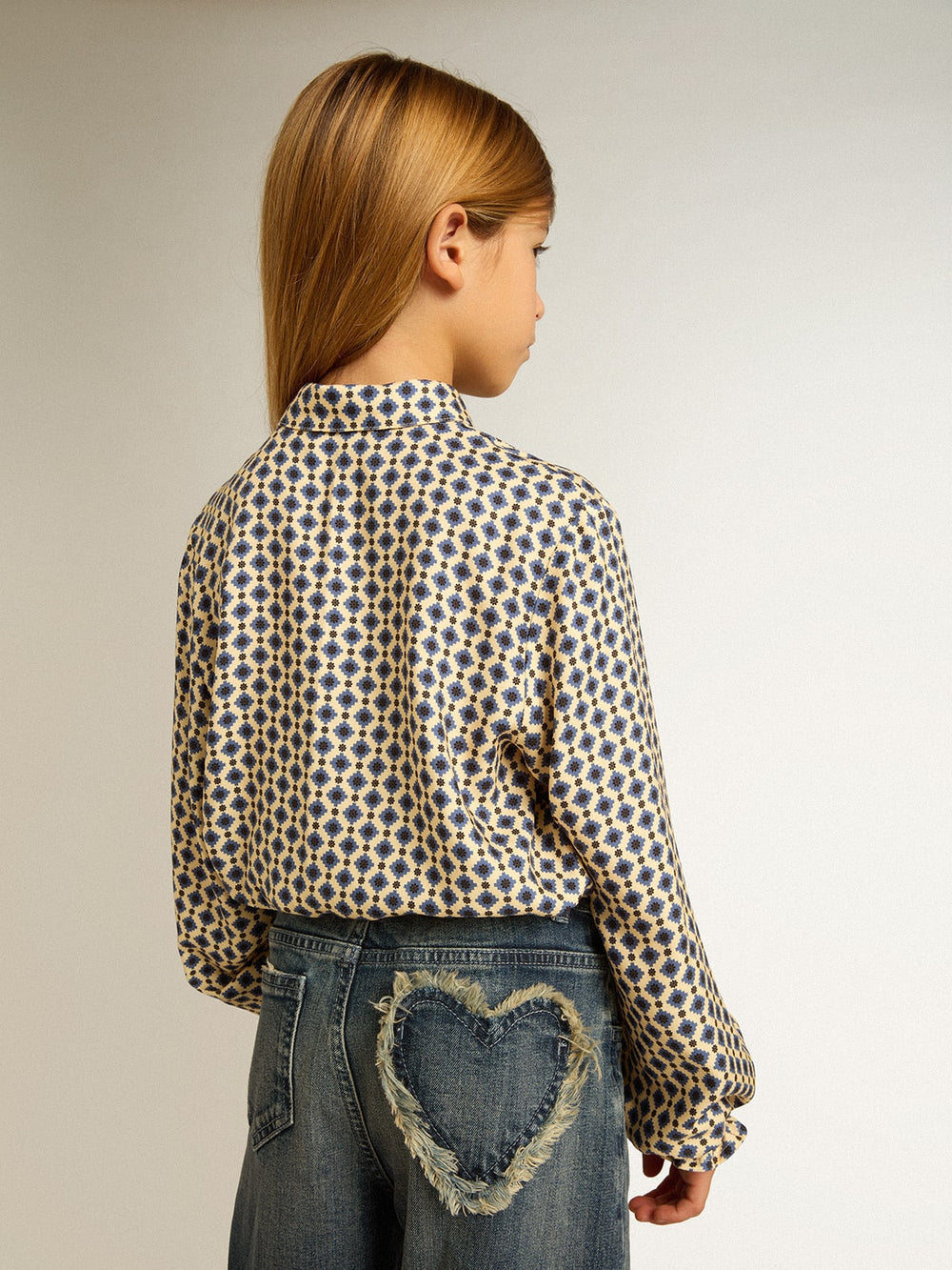 Girls' polo shirt with geometric print