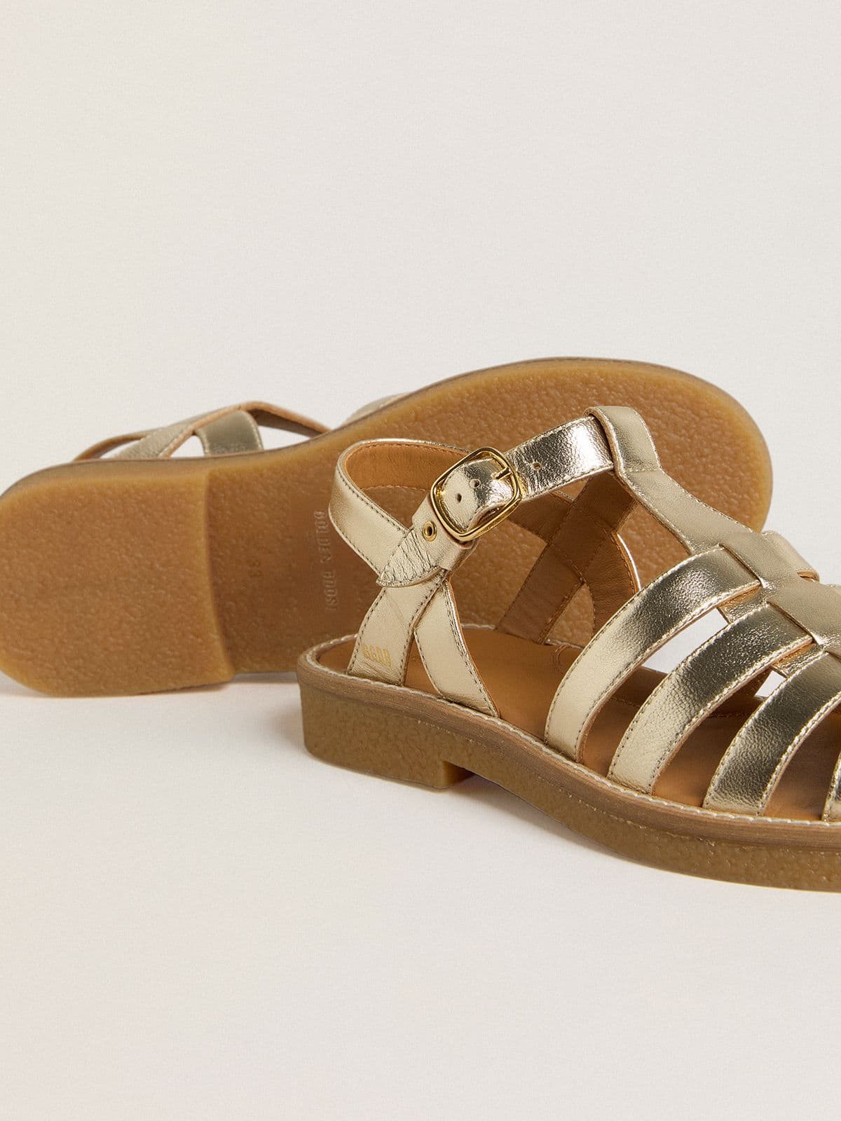 Maxime Young sandals in gold leather