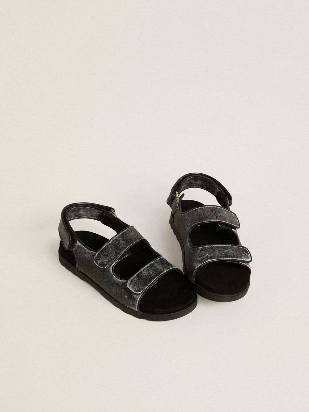Noa Junior sandals in distressed black leather