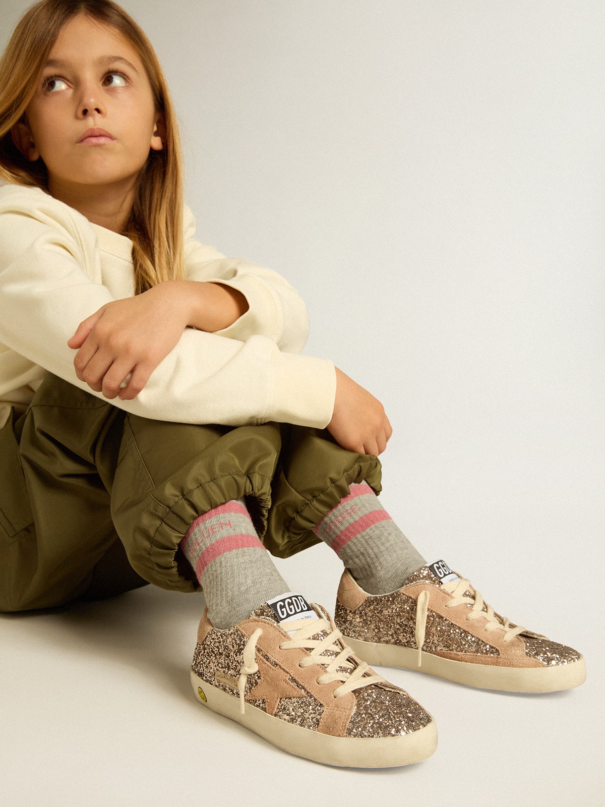 Junior Super-Star in glitter with suede star and heel tab