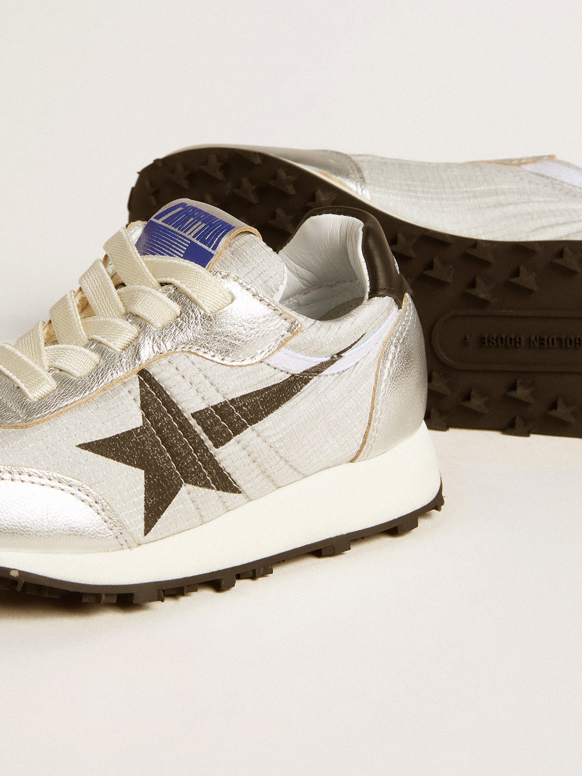 Marathon Young in silver nylon with black star and leather heel tab