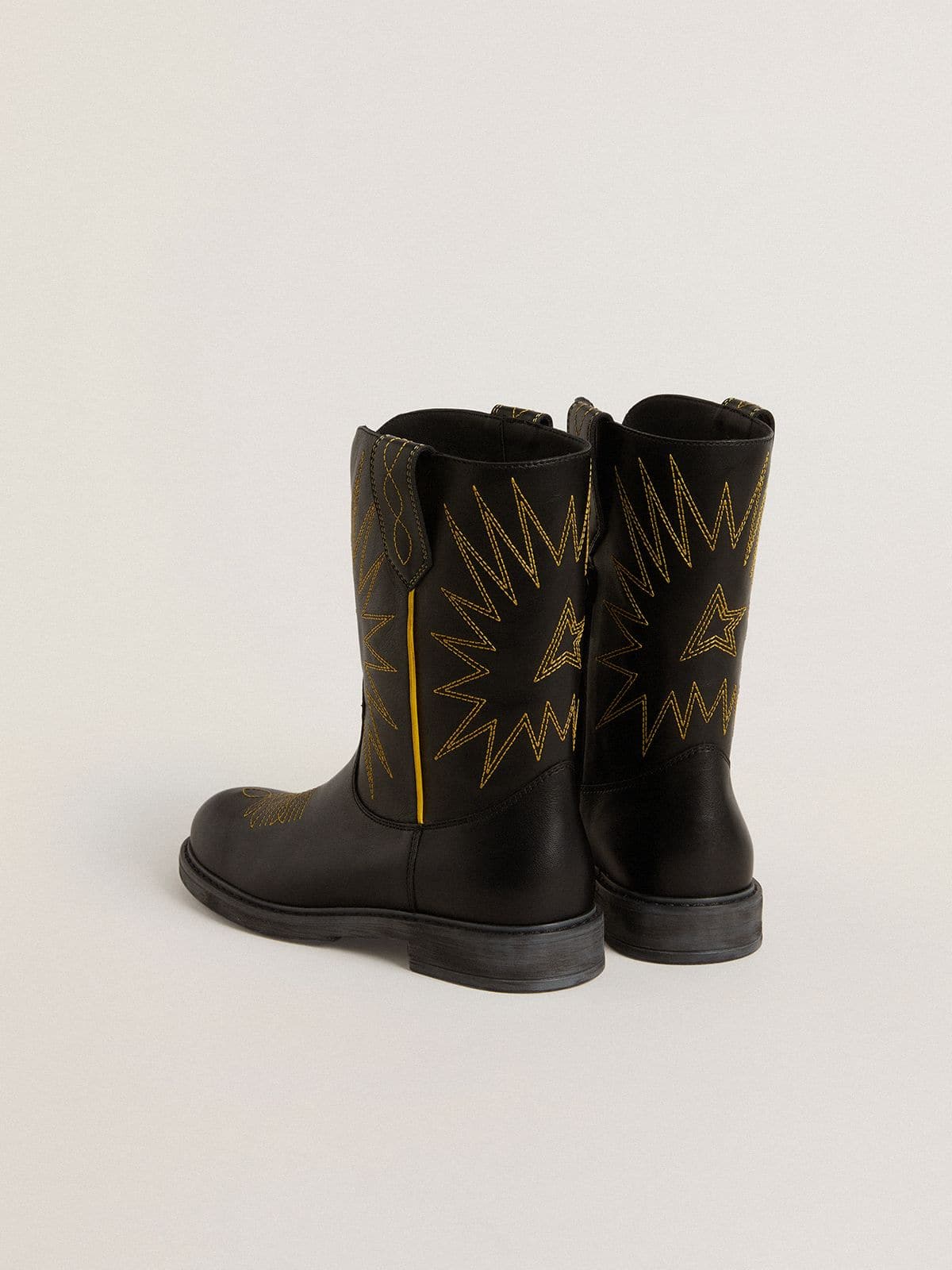 Wish Junior boots in black leather with yellow star embroidery