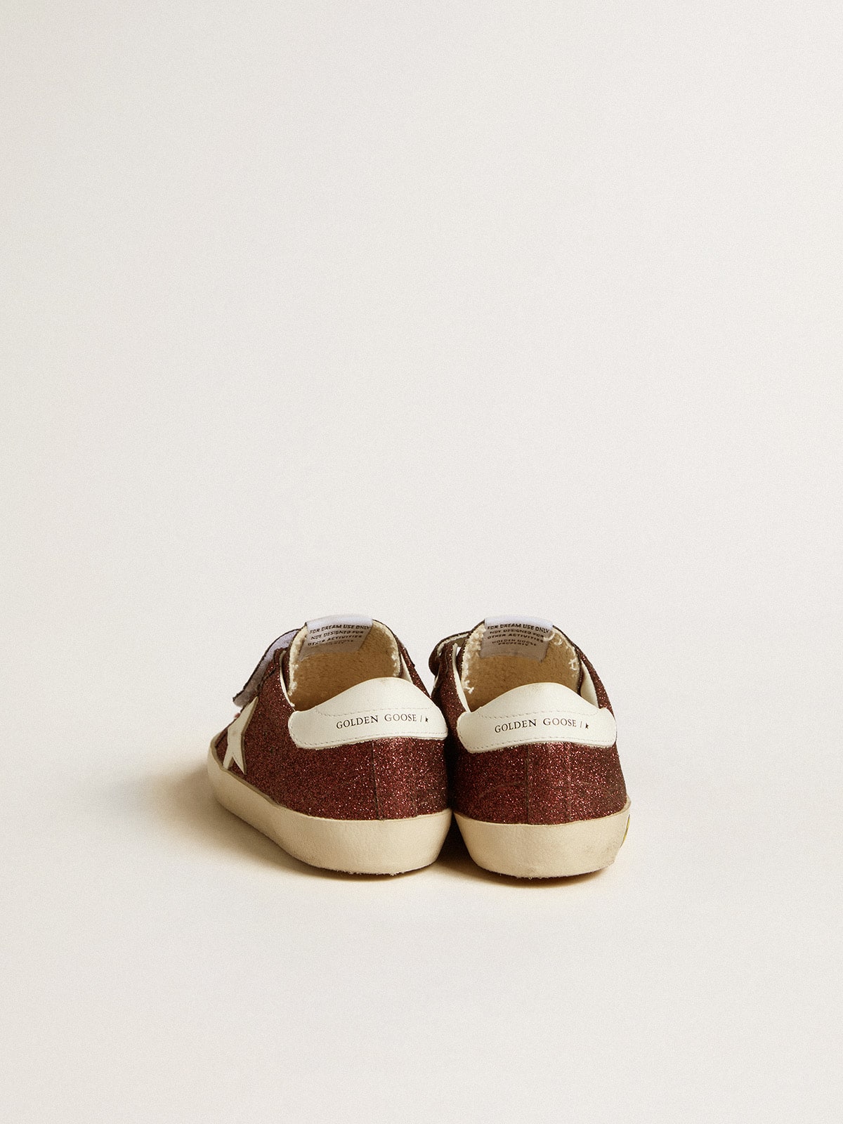Old School Junior in burgundy glitter with leather star and heel tab