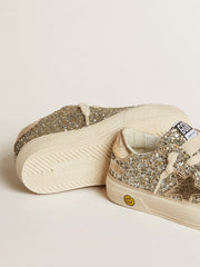 May Young in platinum glitter with metallic leather star and heel tab