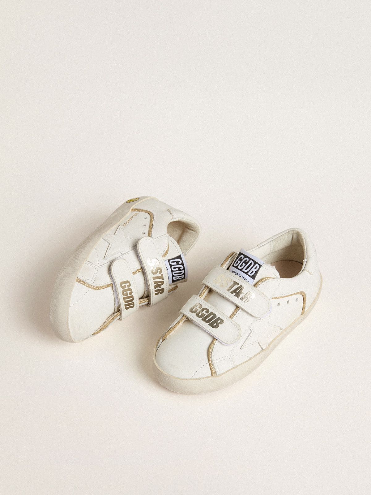 Young Old School in white leather with gold details