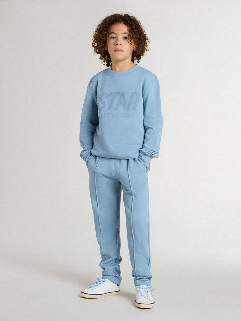 Boys' light blue sweatshirt with lettering on the front