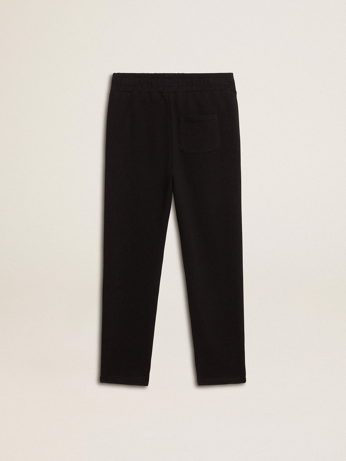 Boys’ black joggers with white stars