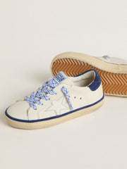 Junior Super-Star in white leather with blue suede heel tab