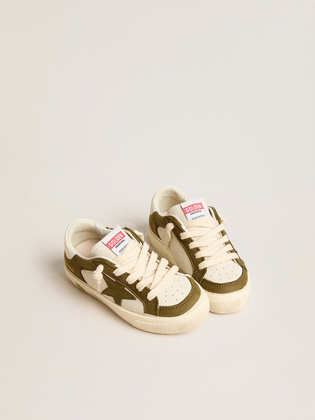 May Teen in white and military green leather